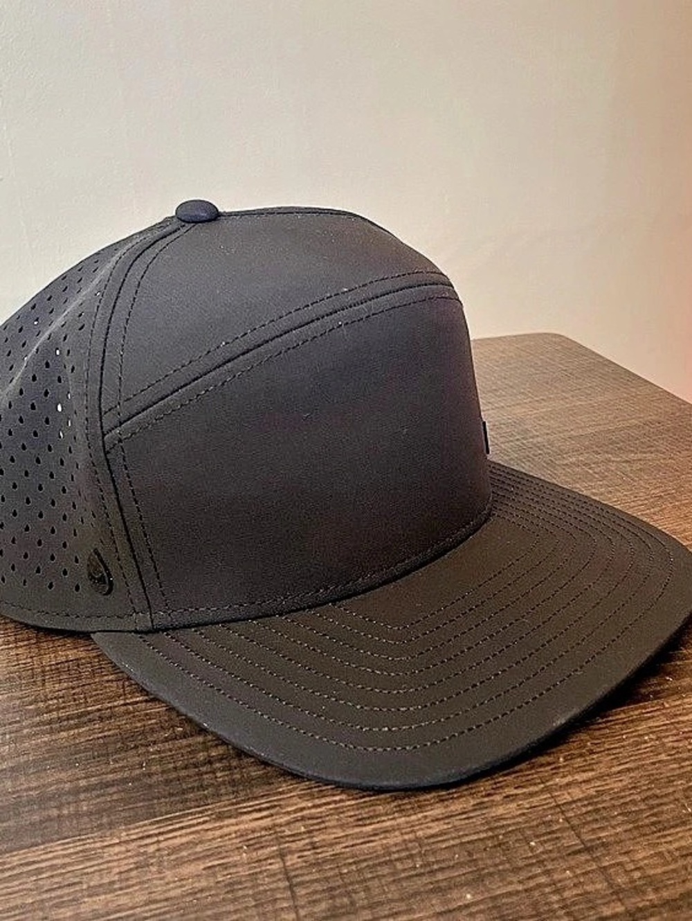 Melin Trenches Perforated Snapback Hat in Black Like New